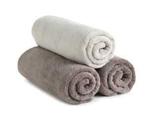 Fototapeta na wymiar Fresh soft rolled towels isolated on white