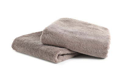 Fresh soft folded towels isolated on white