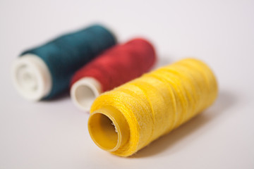 various threads lying in bright colors