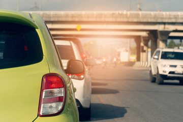 Green car on the road in traffic junction. Open light break.
