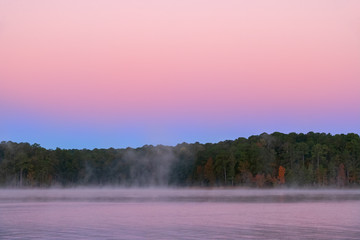 Fototapeta premium Early Morning Fog on Clarke's Hill Lake at Mistletoe State Park, Georgia 