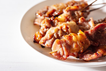 Grilled pork with bamboo stick, poppular street Thai food