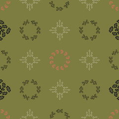 Geometric olive, cream, orange, black and charcoal lacy shapes in vertical and horizontal layout. Seamless repeat pattern for gift wrap, textile, fabric, scrapbooking and fashion.