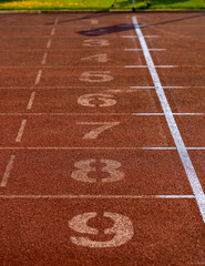 Fototapeta premium Running track at finish position with number