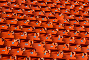 Fototapeta premium Orange stadium seat row with number