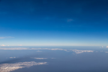 blue sky background with tiny clouds