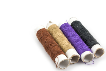 Color thread spool isolated on white