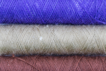 Color thread spool isolated on white