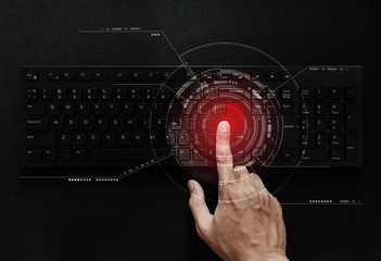 Hand pushing red button on computer keyboard, computer network and connection technology