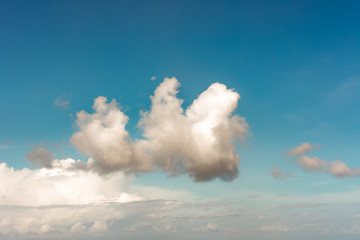 clouds in the sky under over the sea