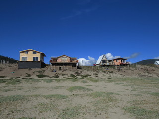 Fototapeta na wymiar Casas en la Playa