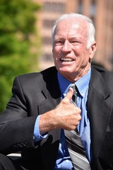 Adult Business Man With Thumbs Up Wearing Suit