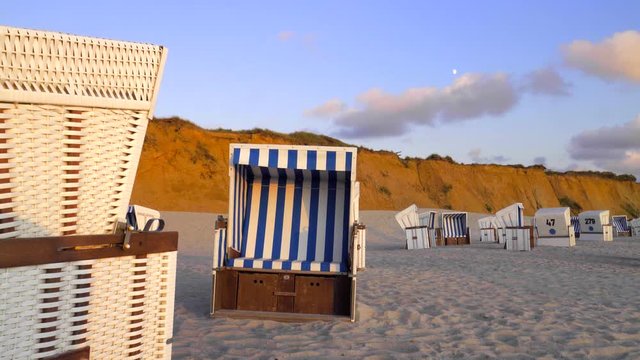 Beach chairs in late sunlight