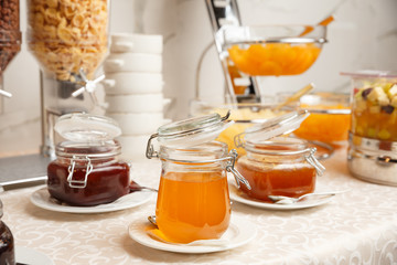 honey in glass jar at the restaurant breakfast line