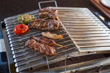 meat with vegetables on the grill 