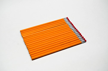 Seventeen new, unsharpened No. 2 pencils neatly arranged as might be done by someone with OCD