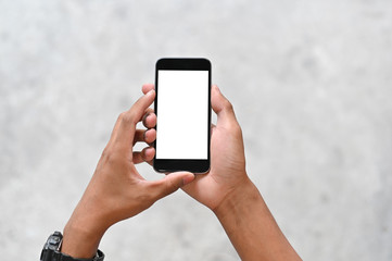 Mockup smartphone mobile on hands holding with present display.