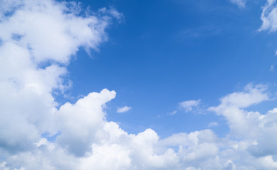 Naklejka na ściany i meble Scenery of bright cloudy blue sky in sunny day.