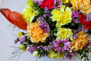 Bright colored spring bouquet on  light background, with  place for text.