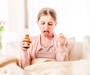 Girl does not like her medicine