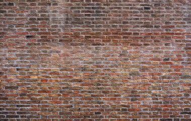 aged red brick wall
