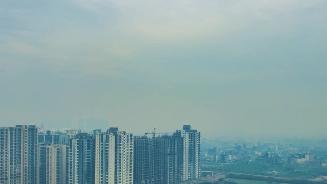 Beautiful Clouds Rolling Over City Skyline. 4K Timelapse. Noida India real  estate advertisement