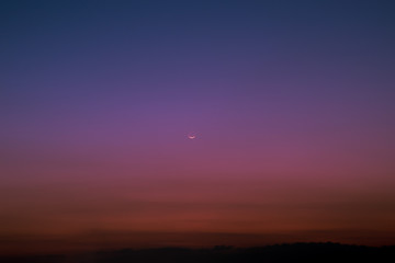 the pink sky with moon