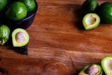 Avocados in a dish on a table