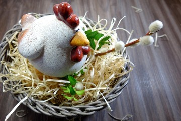 Easter chicken egg in a cup on a blue background - Easter composition.Easter Tradition - Selective focus
