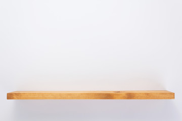 wooden shelf at white background texture