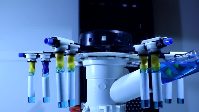 Laboratory Device With Spinning Part Testing Chemical Solvent In Ampules