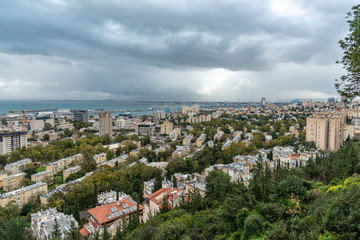Fototapeta premium Haifa, Israel- February 16, 2019 : Downtown Haifa city and port view on a stormy day
