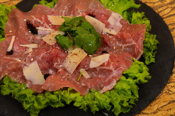 Beef carpaccio with parmesan cheese