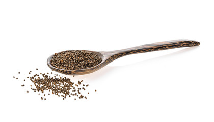 sesame in wood spoon isolated on white background