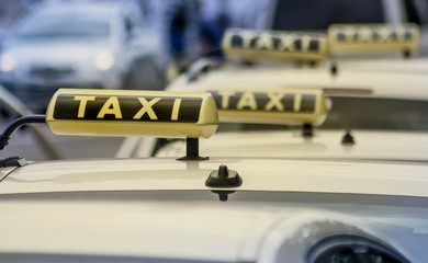 Taxis drive in the traffic of a big city