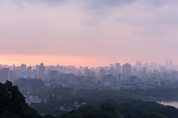 Fototapeta premium panorama of city at sunset