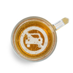 Concept of safe driving. Sign not allow Car access on the beer foam in glass. Isolated on white. Top view