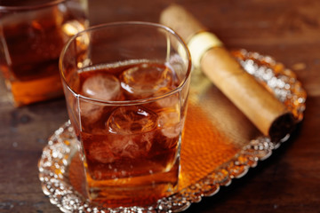 Glass of whiskey with natural ice.