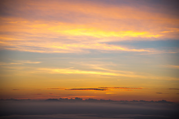 Fototapeta premium Sky gradient from blue to orange sunset