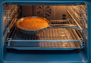 the cake is baked in the oven