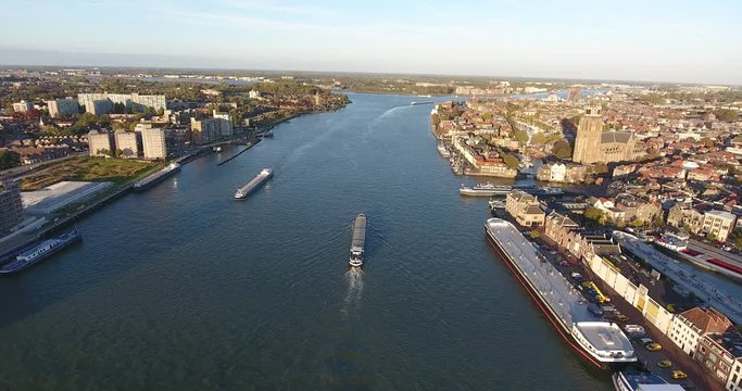 Aerial shoot of river, ship boats on river, Dordrecht, Netherlands