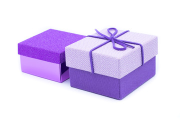 Purple gift box with a purple bow on white background