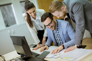 Fototapeta premium Young people working in the office