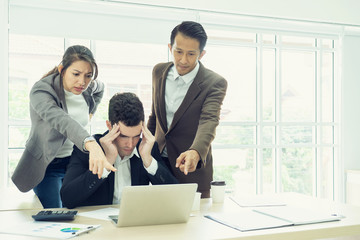 business, teamwork, people and crisis concept. business team sitting  solving problem in office....