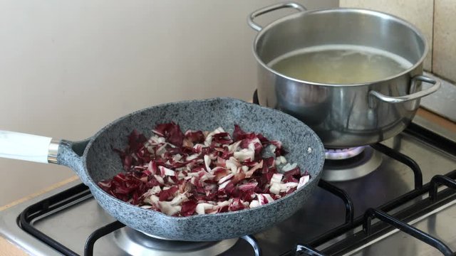 cooking pasta time lapse, tipical italian dish with proscitto crudo e radicchio