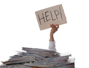 Person under a pile of papers with a hand holding a sign of help. Accounting.