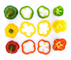 Set of sliced  red bell pepper section pieces isolated over white background, view above