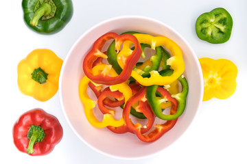 Set of sliced  red bell pepper section pieces isolated over white background, view above