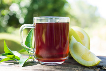 hot red tea cup with lemon