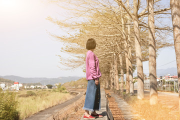 Asian woman stand in the outside